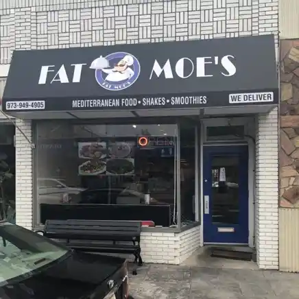 Fat Moe's team preparing fresh Mediterranean dishes in Hawthorne, NJ